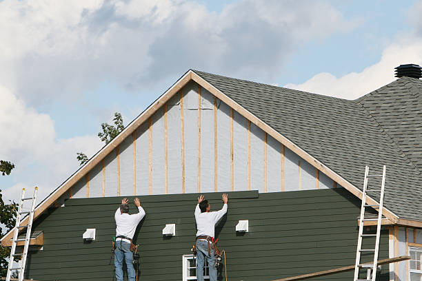 Professional Vinyl Siding technician working in Andover, OH